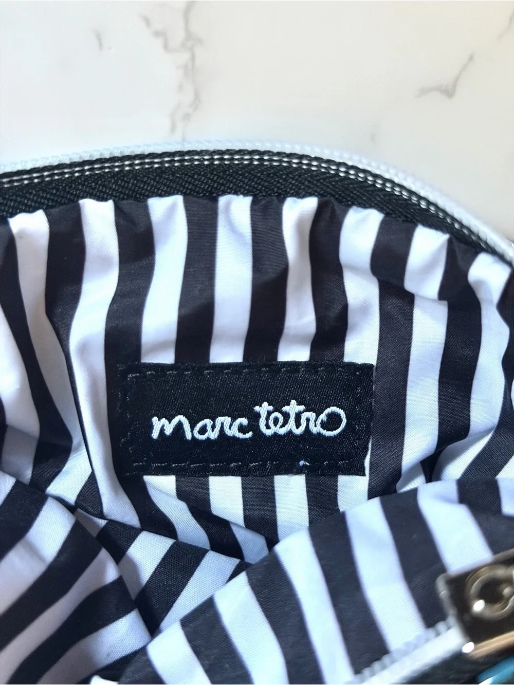 Marc Tetro | High-Gloss Patent Vinyl Pug Zipper Pouch Clutch | NYC Times Square